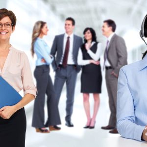 52424194 - smiling asian agent business woman with headsets.